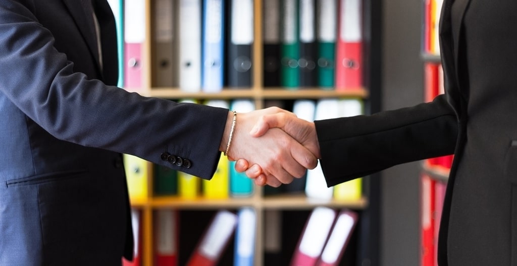 handshake. people creating a marketing strategy